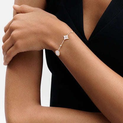 [Regal Jewels]STAR AND SUN 4 MOTIF WHITE MOP PINK GOLD BRACELET
