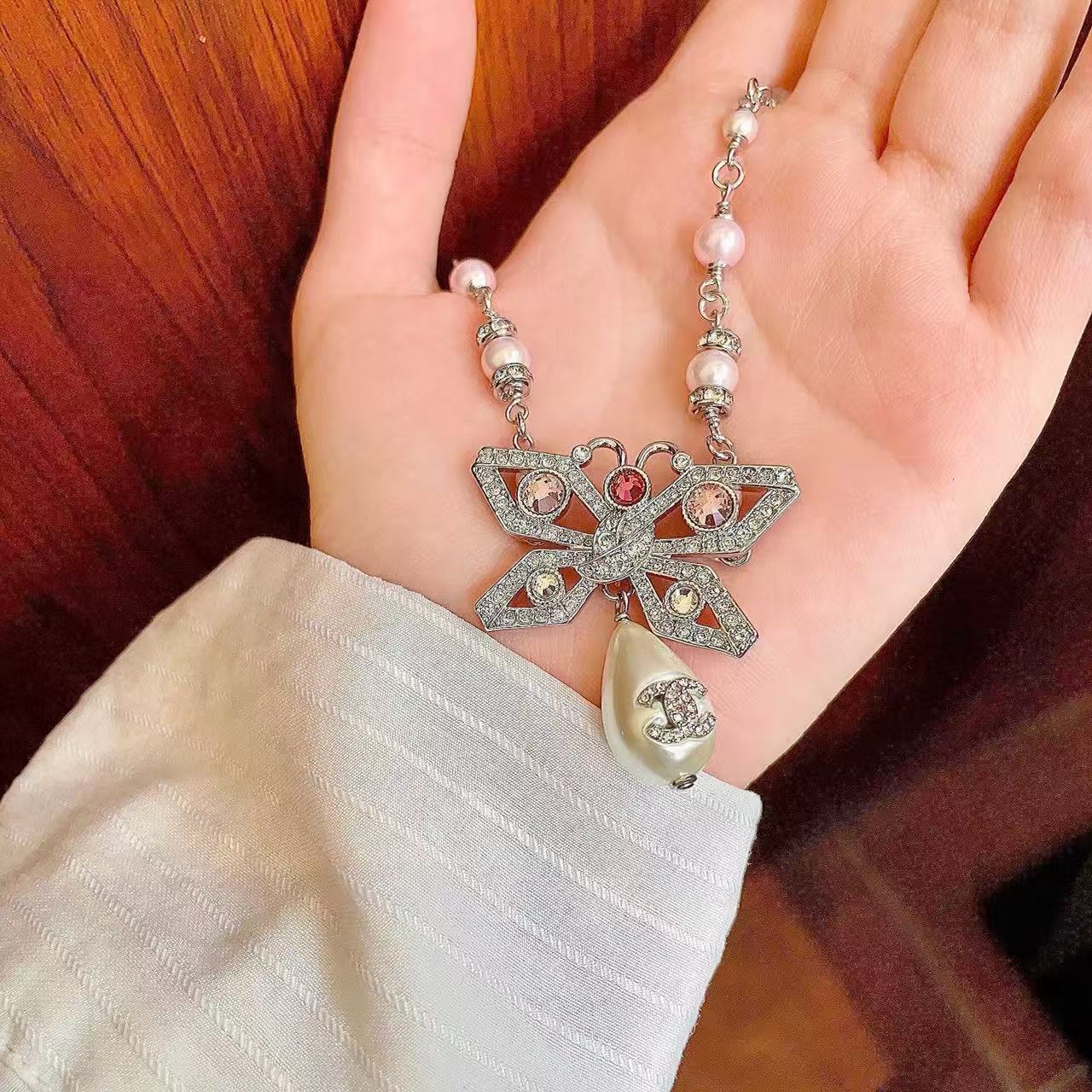 [Regal Jewels] Bow & Pearl Double C Pavé Diamond Necklace